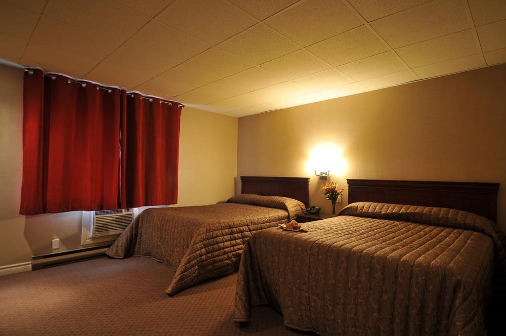Motel Capri Et Suites Repentigny Exterior foto