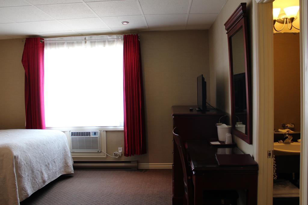 Motel Capri Et Suites Repentigny Exterior foto